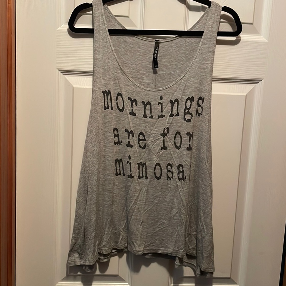 Triumph top, with saying, women’s size lrg